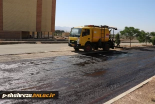 قیرپاشی وآغاز مرحله دوم اسفالت ساختمان جدید 3